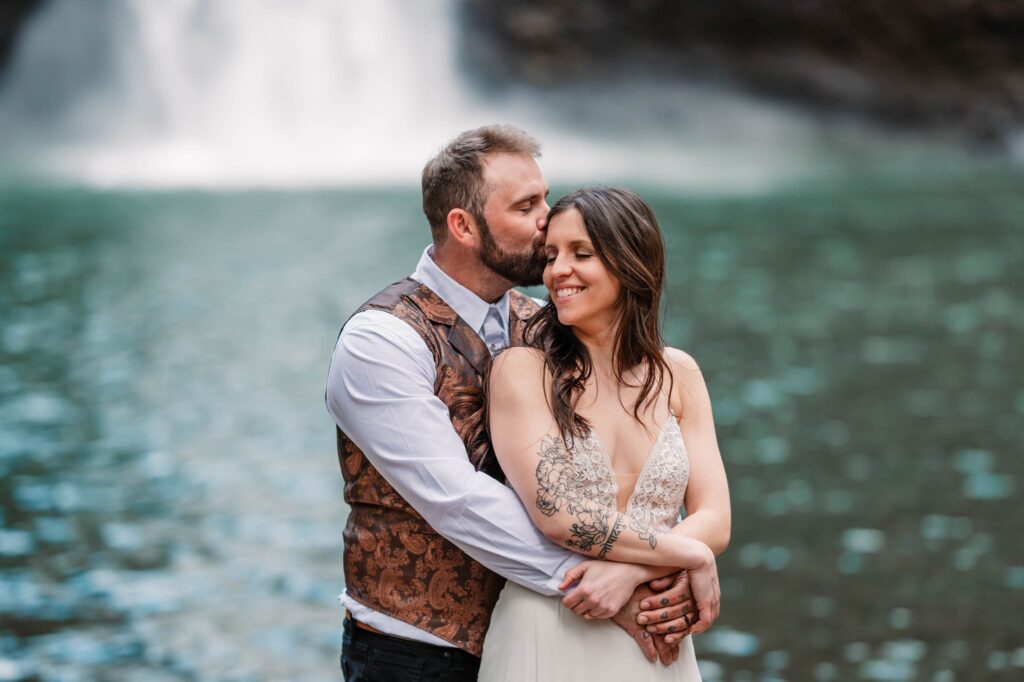 a couple hugging at foster falls
