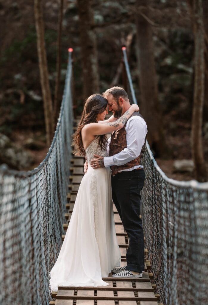 couple on the bridge at foster falls