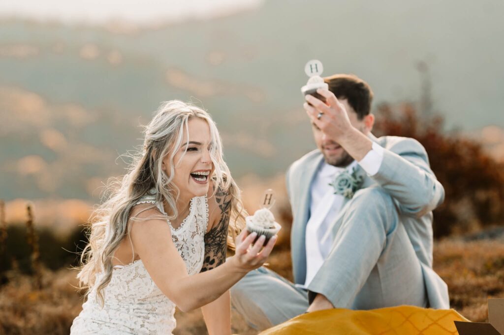 bride and groom eloping in asheville with cupcakes
